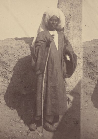 Portrait of a Young Native Man Standing Against a Pillar by Théodule Devéria